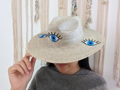 Blue Bohemian Hat For Gift, Handmade Artisan Hat For The Beach, Blue Bohemian Hat As Gift, Handmade Artisan Beach Hat, Artisan Handmade Beach Hat, Handmade Adjustable Straw Hat, Artisan Beach Hats One Size, Artsy Flat Brim Hats For The Beach, Artistic Handmade Sun Hat For The Beach