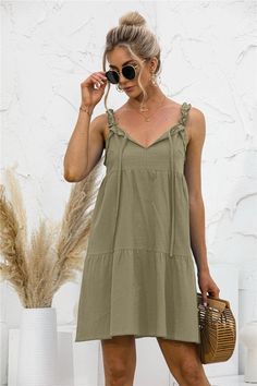 This summer tunic dress is perfect to dress up or down depending on your day. Easily pair this dress with your favorite leather sandals and summer accessories. MEASUREMENTS: Small - Chest & Waist: 35"-37"inMedium - Chest & Waist: 37"-39"inLarge - Chest & Waist: 39"-41"inXL- Chest & Waist: 41"-43"in Chic Summer Sundress, Casual V-neck Sundress For Summer Outings, Sleeveless Summer Fashion Dresses For Day Out, Shift Knee-length Summer Mini Dress, Summer Knee-length Shift Mini Dress, Beach Season Ruffled Midi Dress For Day Out, Sleeveless Summer Sundress, Casual Sundress For Summer, Chic Dresses For Beach Season Outing