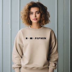 ★ Custom Roman Numerals  - Crewneck Sweatshirt★  A stylish and personalized piece that encapsulates your cherished memories in a timeless fashion. Crafted with utmost attention to detail and made from premium quality materials, this sweatshirt is a perfect blend of comfort and sentimentality. ≫ Material: Soft and breathable cotton blend ≫ Sizes: Available in various sizes (S-2XL) ≫ Fit: Relaxed, unisex fit for all-day comfort (please refer to listing photo for size chart)  ☛To get your size, lay Roman Numerals Dates, Cherished Memories, Roman Numerals, Favorite Shirts, Birthday Anniversary, Personalized Custom, Special Day, Crewneck Sweatshirt, Timeless Fashion