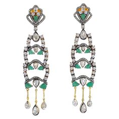 Handcrafted from 18-karat gold and sterling silver, these earrings are set with 2.73 carats emerald, 3.89 carats sapphire and 2.93 carats diamonds. FOLLOW MEGHNA JEWELS storefront to view the latest collection & exclusive pieces. Meghna Jewels is proudly rated as a Top Seller on 1stDibs with 5 star customer reviews. All items manufactured by us are handmade and can be customized or redesigned. Composition Size-80X19 MM Total Weight-21.626 Gold Weight(Gms)-2.37 Silver Weight(Gms)-17.346 Diamond W Art Nouveau Jewelry, Women Diamond, Sapphire Earrings, Topaz Gemstone, Emerald Diamond, Ear Jewelry, Antique Style, Pave Diamonds, Luxury Jewelry