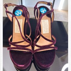 Brand New Salvatore Ferragamo Burgundy/Plum Embroidery Velvet Sandals. Never Wore. Sleek Gold Buckle Along The Back And Burgundy Velvet In Front. Very Beautiful And Finessed Embroidery Detail Among The Heels. The Original Price Is Very Expensive S775, And Two Sizes Are Available. Size 6c Has A Wider Sole Than Size 6b. B Is The Standard Sole Size In The Us. I Got Them From The. Nordstrom Rack, No Dust Bag, And Original Shoe Box, But I Will Ship It With A Very Good Quality Shoe Box. Elegant Purple Sandals With Branded Heel, Elegant Burgundy Sandals For Party, Elegant Purple Block Heel Sandals, Designer Purple Sandals For Formal Occasions, Formal Burgundy Ankle Strap Sandals, Elegant Purple Sandals With Round Toe, Plum Embroidery, Black Espadrilles Wedges, Velvet Sandals