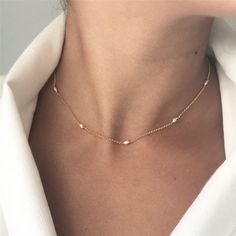 Woman with white blouse wearing 14K Gold Filled Single Pearl Pattern Necklace. Formal 14k Gold Choker Jewelry, Classic Rose Gold Clavicle Chain Necklace, Elegant Delicate Chain Jewelry For Party, Classic 14k Gold Clavicle Chain Jewelry, Anniversary Pearl Chain Necklace, Delicate Chain Fine Jewelry For Formal Occasions, Fine Jewelry With Delicate Chain For Formal Occasions, Elegant Gold Plated Jewelry With Delicate Chain, Elegant Gold-plated Jewelry With Delicate Chain