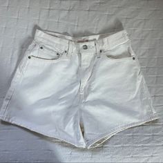 Condition: New Without Tags! Never Been Worn Product Details: - Levi’s Brand - Very High Waisted - Not See Through! Thicker More Rigid Denim - Looser Fit On Legs - Size 29 (Fits True To Size) White Shorts With Belt Loops, White Short Bottoms With Belt Loops, White Short Length Bottoms With Belt Loops, White High Waist Jean Shorts With Belt Loops, White Mid-rise Jeans With Built-in Shorts, Casual White Jean Shorts With Belt Loops, White Cotton Jean Shorts With Belt Loops, White High Waist Relaxed Fit Jean Shorts, Trendy White Jeans With Built-in Shorts