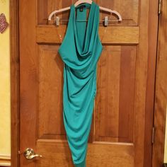 Sexy Spandex Green Deep Cowl Neck Halter Top Dress By Uk2la Plunging Cowl Neck Line Has Draped Single Back Strap That Is Adorn With Gold Square Hardware Starting At The Base Of Neck All The Way To The Bottom Of The Dress. Dress Is Gathered On The Sides That Allows For Ruching At The Belly. This Was Never Worn But Did Remove Tags When Brought On Vacation (Did Not Wear) Dress Is Made Of 95% Rayon And 5% Spandex Will Not Use Offers Welcomed Selling As Is Green Halter Neck Bodycon Dress For Night Out, Stretch Green Halter Dress For Night Out, Green Stretch Halter Dress For Night Out, Backless Halter Dress, Neck Halter Top, Halter Top Dress, Halter Top Dresses, Top Dress, On Vacation