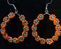 Summer Flowers Beaded Hoop Earrings With Beaded Butterfly - Etsy Orange Beaded Flower Earrings, Summer Beaded Earrings With Tiny Beads, Orange Small Hoop Summer Jewelry, Orange Small Hoop Jewelry For Summer, Summer Small Hoop Orange Jewelry, Summer Orange Small Hoop Jewelry, Orange Hoop Earrings With Colorful Beads, Bohemian Beaded Round Flower Earrings, Summer Flower-shaped Jewelry With Dangling Beads