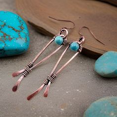 "Add a touch of rustic charm to your look with these wire wrapped copper and genuine turquoise earrings for women. Handcrafted with care, these earrings feature stunning turquoise stones that will add a pop of color to any outfit. The copper wire wrapping adds a unique touch to these earrings, making them a one-of-a-kind accessory. Elevate your style with these beautiful earrings that are perfect for any occasion. Product Details: *Materials: Genuine turquoise stones, copper wire *Earring length Wire Earrings Diy, Hammered Jewelry, Copper Wire Jewelry, Wire Work Jewelry, Work Jewelry, Genuine Turquoise, Copper Earrings, Wire Earrings, Turquoise Earrings