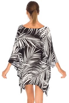 Having a stylish beach cover up is a must! The beautifully printed tunic beach coverup creates a vibrant look. Easy to pull on and easy to pack. Making clothes for the traveling woman. Boho design Lightweight beach dress Semi-Sheer Hand wash in cold water, hang to dry Tropical Long Sleeve Cover-up For Beach Season, Upf 50+ Short Sleeve Tops For Beach, Short Sleeve Tops With Upf 50+ For Beach, Beachy Tropical Print Cover-up For Beach, Beach Tops With Sun Protection And Short Sleeves, Summer Beachwear Tunic For Beach Cover-up, Flowy Cover-up For Resort Season Vacation, Summer V-neck Cover-up With Tropical Print, Printed Beach Cover-up With Kimono Sleeves