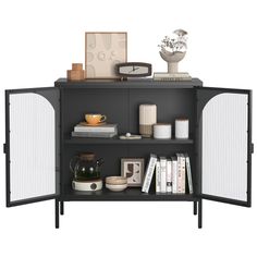 an open bookcase with books and other items on the shelf next to each other