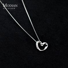 Heart Pendant Necklace for Women Elevate your style with this exquisite 925 sterling silver heart pendant necklace. Designed for elegance, it features a simple, yet captivating, line heart pendant that adds a touch of romance to any outfit. Crafted with precision and plated in platinum, this necklace exudes sophistication and luxury. The fine jewelry piece is perfect for special occasions like weddings or as a thoughtful gift to celebrate a cherished moment. SPECIFICATIONS Item Weight: - Certifi Sterling Silver Heart Pendant, Simple Diamonds, Pendant For Women, Silver Heart Pendant, Chains Necklaces, Chain Choker, Sterling Silver Heart, Heart Pendant Necklace, Silver Heart