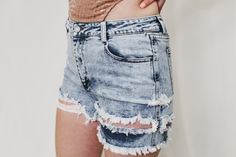 Light wash shorts High waisted Cutoff Hem Distressed Materials 98% Cotton 2% Spandex Care Instructions Hand wash cold Lay flat to dry Do not bleach Cool iron if needed Model Model is 5'6" and wearing size MEDIUM Shorts High Waisted, Distressed Shorts, High Waisted Shorts, Cut Off, Lay Flat, Care Instructions, Bleach, Hand Wash, High Waisted