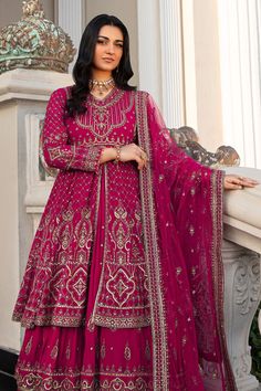 Shocking Pink Pakistani Wedding Dress Double Layered Frock with Lehenga comes with Pakistani raw silk tunic which is embellished with embroidered borders and sequins. There is a richly embroidered dupatta which has sequin work on it. Detailed Description: SKU: WB420 Detailing: Embroidery, Motifs, Naqshi, Sequins, Tilla Color: Shocking Pink Fabric: Net, Tissue, Cotton Silk Design: Fully Embellished Dress with Embroidery, Goldwork Event: Bridal wear, Wedding Embroidered Embellished Dress For Wedding And Diwali, Anarkali Embroidered Dress With Dupatta For Wedding, Embroidered Dress For Wedding Diwali, Wedding Anarkali Embroidered Georgette Dress, Embroidered Embellished Dress For Wedding, Embroidered Georgette Dress With Dupatta For Wedding, Wedding Embroidered Georgette Dress With Dupatta, Transitional Season Embellished Wedding Dress, Transitional Embellished Wedding Dresses