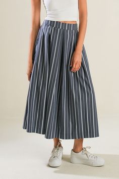 A striped woven full skirt with side zipper closure. Matching Top FT1310. Details: Self : 70% Cotton 27% Nylon 3% SpandexContrast : 100% Polyester Size & Fit - Model is 5`8" And Wearing Size Small- Measurements Taken From Size Small- Approx. Length: 33" Chic Striped Pleated Bottoms, Striped Flared Skirt For Summer, Spring Striped Flared Skirt, Chic Striped Midi-length Bottoms, Casual Striped Pleated Bottoms, Chic Striped Midi Length Bottoms, Striped Cotton Relaxed Skirt, Striped Pleated Skirt Bottoms For Summer, Striped Pleated Skirt For Summer