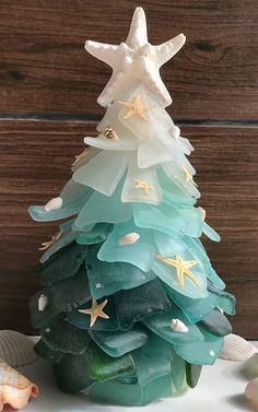 a christmas tree made out of sea glass