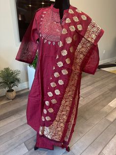 Just looks like a wow!! This premium, Chanderi mixed silk salwar suit set consists of a kurti top with mirror work on the neck yoke and an open Chinese collar, a straight pant with elastic band and a zari work banarasi dupatta. Shade of the set is a deep oil red and perfect in time for Valentines day :) Size: Fits bust sizes 45-46 inches (size 3XL) Size 3XL | Super gorgeous mirror work salwar suit set with banarasi dupatta | Chanderi silk suits online shopping usa | Indian kurti set | plus sized Dola Silk Palazzo Set With Mirror Work, Festival Chanderi Palazzo Set With Mirror Work, Chanderi Bandhani Print Palazzo Set With Straight Kurta, Bandhani Print Chanderi Palazzo Set With Straight Kurta, Diwali Slub Silk Kurta With Mirror Work, Straight Kurta In Dola Silk With Mirror Work, Straight Dola Silk Kurta With Mirror Work, Chanderi Salwar Kameez With Gota Work, Dola Silk Palazzo Set With Straight Kurta