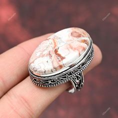 Dive into the magical temptation of this stunning Ring in attractive shape and design made of Sterling Silver studded with Laguna Lace Agate. An essential ornament to add in your jewellery collection! Welcome in Secretts Metal :- Sterling Silver 925 Gemstone Name :- Laguna Lace Agate Stone Creation :- Natural Laguna Lace Agate Pendants https://www.etsy.com/shop/Secretts?ref=seller-platform-mcnav&search_query=Agate+pendants Laguna Lace Agate Earrings https://www.etsy.com/shop/Secretts?ref=seller-platform-mcnav&search_query=Agate+earrings Laguna Lace Agate Rings https://www.etsy.com/shop/Secretts?ref=seller-platform-mcnav&search_query=Agate+rings Occasion : Birthday Events, Lovely Valentine's Day Gift, Anniversary Gift, Weeding Gift, Engagement Gift, Lover Gift, Hen Party And Other Occasion. Lovers Jewelry, Unique Rings Vintage, Colored Stone Rings, Cocktail Jewelry, Womens Ring, Agate Earrings, Trendy Ring, Ring Size 10, White Agate