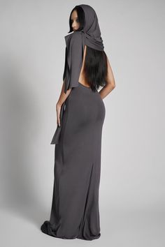 Make them take a second glance. Maxi dress made from luxuriously dense Jersey, featuring an add-on hood that can be draped across the shoulders and over the crown of the head, with plunging halter top neckline. FIT NOTES:Tatianna wears a size Small, 5'9, with a 26" waist. MATERIALS:95% rayon 5% spandexMade in China Dresses With Hoods, Top Neckline, The Crown, Halter Top, Dress Making, Take That, Crown, Ships, Maxi Dress