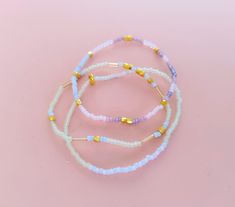 Dainty Beaded Stackable Bracelets in pastel tones, select one two or three stretch bracelet Toho seed beads and cooper beads Pastel Stretch Bracelet With Colorful Beads As Gift, Pastel Beaded Stretch Bracelet As Gift, Pastel Beaded Stretch Bracelet Gift, Pastel Beaded Stretch Bracelet, Pastel Stretch Bracelet With Round Beads As Gift, Pastel Stretch Bracelet As Gift, Bracelets Etsy, Stackable Bracelets, Bead Bracelets