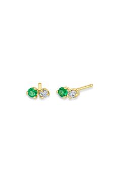 Prong-set emeralds and diamonds shine side by side in these beautiful stud earrings set in 14-karat gold. 1/4" drop Total diamond weight: 0.06ct. Color: F–G Clarity: SI2 14k gold/emerald/diamond Made in the USA >Diamond Guide Green Diamond Earrings In Fine Jewelry Style, Green Diamond Earrings Fine Jewelry, Green Diamond Earrings With Diamond Accents, Gold Emerald Earrings With Brilliant Cut, Classic Green Diamond Earrings With Accents, May Birthstone Brilliant Cut Fine Jewelry Earrings, May Birthstone Fine Jewelry Diamond Earrings, Emerald Yellow Gold Diamond Earrings Fine Jewelry, Yellow Gold Diamond Earrings With Emerald