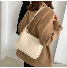 Material: PU
Texture: Soft
Closed: Zipper
Size: 9.8"L x 2.4"W x 7.9"H in; It is enough to hold daily stuffs including cell phones, sunglasses, wallet, key etc.
Baldric: Adjustable shoulder strap نظارات شمسية, Cross Body Bags, Bags Tote, Black Khakis, Women's Handbags, Leather Backpack, Cell Phones, Cross Body, Tote Bags