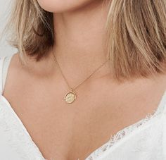 "Gorgeous gold coin necklace a must-have addition for your jewelry box. Dainty 14k goldfilled chain with gold-filled coin pendant can be worn alone or layered. ♥ Necklace length on the model is 16 inches - choose your size from 15\" - 18\" ♥ Coin measures 20 mm ♥ Our jewelry is made of 100% top quality USA components ♥ It comes in a beautiful package ready for gifting. ----------------------------------------------------------------------- ALL USA ORDERS: Shipping Transit Time Is 3-5 Business Da Delicate Coin Pendant Necklace, 14k Gold Filled Coin Pendant Necklace As Gift, Delicate Coin Chain Jewelry As Gift, Delicate Coin-shaped Chain Jewelry For Gifts, Delicate Coin Chain Jewelry Gift, Dainty Coin Charm Necklaces For Gifts, Dainty Coin Charm Necklaces As Gift, Dainty Coin Medallion Necklace Gift, Dainty Coin Charm Necklace Gift