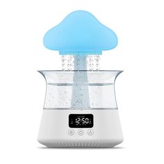 an alarm clock with a blue cloud in the top and water coming out of it