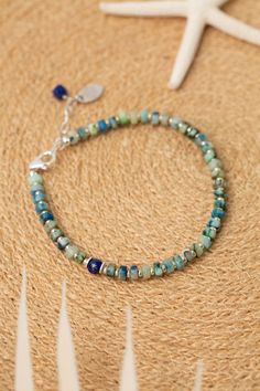 Indulge in the beauty of the sea with our Pacifica Collection! Each piece is meticulously handcrafted with stunning shades of blue, capturing the essence of ocean waves and clear skies. Sterling Silver (Lead & Nickel Free) Lapis Lazuli, Jasper 7.5-8.5" adjustable with sterling silver lobster claw clasp We hand select our natural materials, thus there may be slight variations in color and/or size that will not detract from the overall aesthetic. Our unique handcrafted designer jewelry for women i Floyd Va, Silver Gold Earrings, Silver Gold Necklace, Lapis Lazuli Blue, Blue Jasper, Simple Bracelets, Gold Collection, Ocean Waves, Designer Jewelry