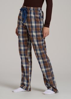 About Our Women’s Tall Flannel Pajamas You’ll never want to get out of bed when you’re wearing these women’s tall pajama pants. For years, tall women have had to settle for PJs that are way too short and fit in all the wrong places, but not anymore. You loved our classic flannel PJs and now we’re bringing you a pair with a regular fit and an open-bottom leg with all the length you need. These pajama pants have been designed exclusively for women between 5’9” and 6’6” with two different length op Flannel Pjs Aesthetic, Plaid Pjs, Flannel Pj Pants, Flannel Pjs, Scrubs Dress, Athleisure Summer, Christmas Pajama Pants, Cozy Sleepwear, Flannel Pajama Pants