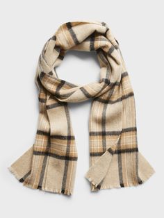 Supremely soft and warm, this wool scarf sports a checked motif that's sure to add an extra pop of visual interest to any outfit.  Length: 76" (193cm) Width: 12" (30. 5cm) Classic Plaid Scarves For Winter, Classic Plaid Scarves For Fall, Casual Wool Plaid Scarves, Plaid Scarves For Cold Weather In Winter, Casual Plaid Wool Scarf, Casual Plaid Scarves For Cold Weather, Casual Wool Scarves For Fall, Scarf Outfit, Grey Scarf