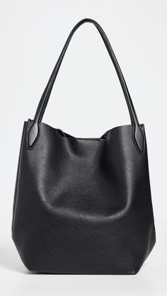 Pebbled cowhideExpandable sides with interior claspOpen top with magnetic closurePatch interior pocketShoulder strapsUnlinedWeight: 28oz / 0.79kgImported, PhilippinesStyle #MADEW46668 Madewell Tote, Madewell Bags, Basket Tote, Straw Tote, Autumn Style, Black Tote, Shopper Tote, Large Tote Bag, Womens Tote