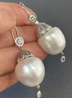 HUGE 14K White Gold 18 South Sea Baroque Pearl Diamond Filigree Duster Earrings | eBay Luxury Briolette Pearl Earrings, Luxury Pear-shaped Pearl Earrings, Oval High Luster Pearl Earrings For Formal Events, Formal High Luster Oval Pearl Earrings, High Luster White Pearl Earrings For Evening, White High Luster Pearl Earrings For Evening, Formal White High Luster Pearl Earrings, Elegant Hallmarked Jewelry For Opera, Luxury White Pear-shaped Pearl Earrings