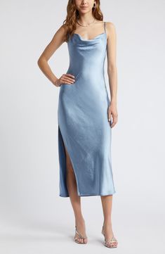 Effortless to style up or down, this gracefully draped satin slipdress belongs in your wear-on-repeat collection. 26 1/2" to 46" center front length (size Medium) Cowl neck Adjustable straps Unlined 100% polyester Machine wash, tumble dry Imported Blue Cowl Neck Dress, Bridesmaid Dresses Under 100, Affordable Bridesmaid Dresses, Cowl Neck Dress, Satin Slip, Blue Satin, On Repeat, Cowl Neck