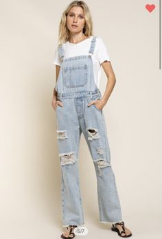 Classic Denim overalls in a slouchy boyfriend fit. Kangaroo pocket in the front and button side closures. Revolt Overalls, Utility Overalls, Ripped Overalls, Overalls 90s, Bootie Sandals, Frayed Denim, Black Espadrilles, Denim Overalls, Boyfriend Fit