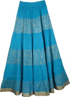 Blue Cotton Crisp Tall Skirt - This is a very crisp and crinkled summer long skirt with gold brocade-lace work and gold pattern in hand block print. The high quality long cotton skirt has an elastic waist and is half lined for a graceful full fit. The hemline is accentuated by a golden ribbon. This skirt surely looks beautiful with its golden highlights in the beautiful blue (see detailed picture below). Top it with a sexy cami in a light color (may be white) and it gives you a designer flair wi Festive Long Blue Skirt, Traditional Blue Skirt For Festivals, Traditional Long Blue Skirt, Traditional Blue Maxi Skirt, Traditional Blue Flowy Maxi Skirt, Traditional Blue Flowy Skirt, Traditional Flowy Blue Skirt, Summer Long Skirt, Long Cotton Skirt