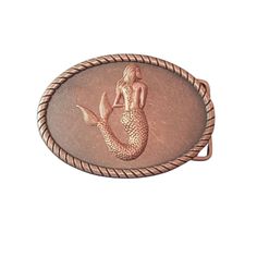 "A high quality Antique copper belt buckle has been set with a detailed oxidized rose gold mermaid stamping. The buckle fits up to a 1 1/2\" belt and will come in a velvet gift pouch. Measures: 2 3/4\" x 3 3/4\"" Mermaid Belt, Copper Belt, Marine Science, Handmade Evil Eye, Gold Mermaid, Oxidized Brass, Necklace Box, Skull And Crossbones, Gift Pouch