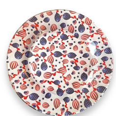 an american patriotic plate with red, white and blue designs