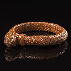 Discover Unparalleled Elegance: Shiny Hand-Braided Leather Custom Bracelet Elevate your accessory game with our exquisite Hand-Braided Leather Bracelet, a masterpiece of craftsmanship and style and cool leather jewelry. Crafted from 16 strands of premium leather, this bracelet is a symbol of individuality and Western-inspired fashion. women's and men's jewelry - a bit of stiff leather cuff, inside flat outside, is convex.  Key Features: Fish-Bone Braiding: The intricate fish-bone braiding technique adds a touch of sophistication and uniqueness to your wrist. Each strand tells a story, making this bracelet not just an accessory but a piece of art. Gaucho Knot Accent: At one end of this remarkable bracelet, you'll find a gaucho knot, a nod to Western heritage. It's a statement piece that exe Personalised Gifts For Friends, Presents For Best Friends, Custom Bracelet, Bracelet Leather, Personalized Gifts For Dad, Braided Leather Bracelet, Fish Bone, Inspired Fashion