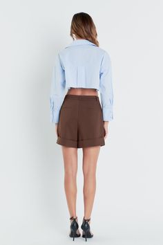 Upgrade your summer wardrobe with our Belted Shorts Trousers. Featuring a flattering mini length and a trendy waist belt, these shorts are perfect for a stylish and comfortable look. The bottom opening fold adds a touch of sophistication, while the trouser crease adds a polished finish to your outfit. Made with high-quality materials, these shorts are designed for both fashion and functionality. Suitable for any occasion, our Belted Shorts Trousers are a must-have for every fashion-forward woman Knitwear Trends, Knit Loungewear, Strapless Bodycon Dress, Denim Sweater, Belted Shorts, Leather Denim, Blazer And Shorts, Tweed Dress, Leather Dresses