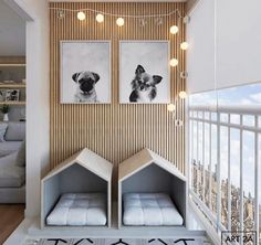 there are two pictures hanging on the wall in this living room, one has a doghouse bed