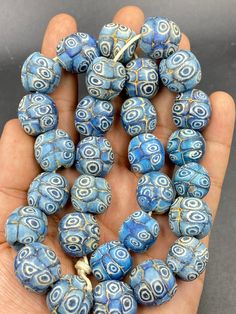 beautiful authentic unique piece Gabri  with beautiful colors old ancient afghani Gabri beads Natural Stone Round Beads For Festivals, Bohemian Natural Stone Beads For Festivals, Traditional Large Blue Beads, Traditional Handmade Beads For Rituals, Bohemian Colorful Round Beads, Gems, And Cabochons, Traditional Blue Oval Beads Jewelry, Colorful Bohemian Beads, Gems, And Cabochons, Traditional Blue Oval Beaded Jewelry, Artisan Handmade Beads For Rituals