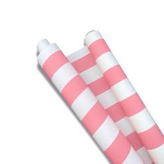 two pink and white striped paper rolls