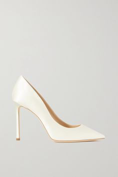 You won't regret choosing pumps as classic as Jimmy Choo's 'Romy' pair for your special day. Crafted in Italy from ivory satin, they have a leg-lengthening pointed toe and 100mm stiletto heel that'll balance long hemlines. Jimmy Choo Romy 100, White Stiletto Heels, Jimmy Choo Wedding Shoes, Ivory Heels, Elegant Wedding Shoes, Jimmy Choo Bridal, Bridal Pumps, Jimmy Choo Romy, Wedding Pumps