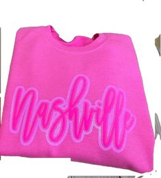 Pink Text Print Sweatshirt For Spring, Pink Sweatshirt With Text Print For Spring, Pink Lettered Top For Streetwear, Pink Streetwear Tops With Lettering, Pink Tops With Lettering For Streetwear, Pink Streetwear Top With Lettering, Pink Long Sleeve Sweatshirt With Lettering, Neon Pink, Nashville