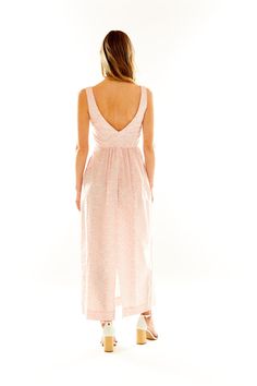 The Mary Alex Dress is a spinoff of a piece Lucy designed as a bridesmaid dress for her sister's wedding. The goal of this silhouette was to be extremely universal but endlessly sophisticated, allowing women to wear the dresses time and time again. Because it was such a hit, we decided to introduce it with a more casual cotton poplin, making it a summertime staple. Crafted in our best-selling Liberty Primrose Pink motif, this square neck, sleeveless, ankle-length dress features a fitted bodice w Summer Dresses For Wedding Guest With Pleated Bodice, Sleeveless Bridesmaid Gown For Spring, Bridesmaid Midi Dress With Tie Back And Fitted Bodice, Wedding Bridesmaid Dress With Empire Waist, Feminine Empire Waist Dress With Ruched Bodice, Feminine Midi Dress With Pleated Bodice For Garden Party, Spring Midi Dress With Pleated Bodice For Wedding Guest, Spring Wedding Guest Midi Dress With Pleated Bodice, Spring Wedding Guest Dress With Pleated Bodice