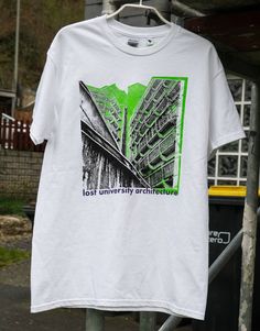 Here you can get the t-shirt with screen print "lost university architecture" On the back there is another design on the topic of sculpture at the university building in Siegen. Made for love of architecture. The T-shirt is white and in size M These are unique pieces made from 100% cotton. They are new, the design is mine. They vary slightly as it was printed by hand using a screen. Screen Print Tshirt, University Building, University Architecture, Screen Printed Tshirts, Tshirt Ideas, Graphic Tee Shirt, Graphic Tee Shirts, Screen Print, For Love