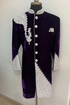 DESCRIPTION [-] Walk in with panache and grace in this aristocratic purple wedding sherwani. Try out this latest sherwani with silver zardosi embroidery. Colour options available. Material options available Customisation available. Purple Formal Sets For Diwali, Formal Purple Salwar Kameez For Festive Occasions, Festive Purple Salwar Kameez For Formal Occasions, Elegant Purple Unstitched Suit For Formal Occasions, Formal Purple Dupatta For Diwali, Traditional Purple Formal Sets, Formal Purple Sets With Zari Work, Elegant Formal Purple Unstitched Suit, Formal Purple Sets With Traditional Drape