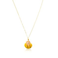 The ideal accessory for any style. Starring an exquisite, wire-wrapped Hawaiian Sunrise Shell, this timeless piece is sure to stay in rotation for years to come. 18" 14k gold-plated chain with small bead Authentic 0.75" Hawaiian Sunrise Shell Expertly handcrafted on Oʻahu A true one-of-a-kind piece - you will receive the photographed necklace Yellow Gold-plated Round Pendant Jewelry, Gold Plated Round Pendant Jewelry, Gold Plated Yellow Round Pendant Jewelry, Yellow Pendant Jewelry With Lobster Clasp, Handmade 14k Yellow Gold-filled Necklaces, Handmade Yellow Gold Plated Jewelry, Handmade Yellow Gold-plated Jewelry, Yellow Wire Wrapped Necklace As Gift, Yellow Gold Wire Wrapped Pendant Jewelry