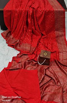 New Lunch* *Fabric*   PREMIUM BANARASI   georgette SILK SAREE  COLLECTIONAll over  buty   dizain  *Border* 👉🏻-----     DESIGNER  BORDER    *Pallu and blouse*  --- RICH  ZARI WOVEN PALLU. BLOUSE  pilen with border....   *Quality*----- excellent Granted 🥰🥰 Saree Length 5.50 Blouse lenth 90 centimetre  Saree wait 650 garam  Washing Instructions : Dry Clean only Disclaimer : The color of actual product may vary slightly from the images provided due to photographic lighting conditions and differe Banarasi Georgette Saree Blouses, Traditional Wedding Saree, Georgette Silk Saree, Banarasi Sari, Bridal Anklet, Saree Georgette, Saree Bollywood, Saree Banarasi, Wedding Saree