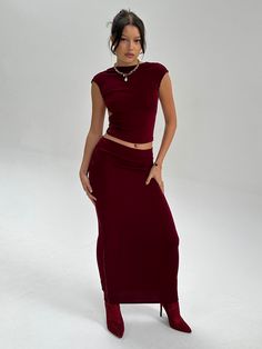 Body sculpting double lined midi skirt. Made with textured jersey spandex. Evening Midi Skirt In Elastane, Party Midi Skirt In Elastane, Party Elastane Midi Skirt, Party Midi Length Elastane Skirt, Fitted Elastane Asymmetrical Maxi Skirt, Wine Red Skirt Outfit, High Neck Backless Top, Wine Red Skirt, Red Skirt Outfits