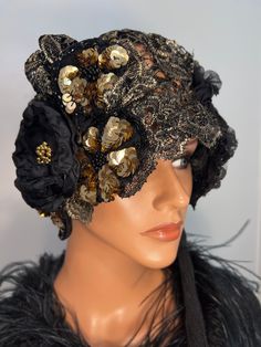 "This is flapper hat cloche has my handmade design is in version of my vintage collection 1920's style hats. I add a flavor of Elizabeth's, 20's and Modern Era, looks elegant and feminine. Made from black golden lace  embroidery golden metallic, adorned floral, tassel on one side, fully stitching by my hand.   Measurement hat inside 24\". Fabric is not stretchy. Mannequin's head about 22''. Show your beautiful personality, it's like outfit can't be complete without Special Hat. This unique one o Fitted Flapper Headpieces For Evening, Fitted Flapper Style Headpiece For Evening, Fitted Flapper Style Evening Headpieces, Flapper Style Fascinator For Vintage Events, Flapper Hat Headpiece For Party, Flapper Party Hat Headpiece, Adjustable Gatsby Style Costume Hats For Evening, Adjustable Gatsby Style Evening Costume Hat, Adjustable Gatsby Evening Headpiece