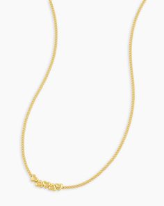 Create a romantic look with this heart necklace. This gorgeous gold-plated necklace features a classic chain design that is perfect for any occasion. To wear, simply drape the chain around the neck, adjust, and secure the clasp. Wear it solo as a statement piece, or layer it with other necklaces for a layered look. Lou Heart Necklace in 18k Gold, Women's by gorjana Classic Gold Heart Necklace With Delicate Chain, Elegant Heart-shaped Name Necklace With Adjustable Chain, Chic Gold Heart Necklace With Adjustable Chain, Elegant Gold Heart Necklace With Cable Chain, Gold Heart Pendant Name Necklace With Adjustable Chain, Earrings Stacking, 14k Gold Necklace, Romantic Look, Mix Style